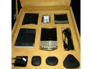 FOR SALE: BRAND NEW BLACK BERRY PORSCHE WITH ARABIC KEY BOAR